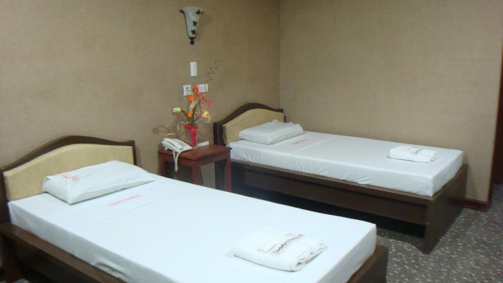Obdulia'S Business Inn Dumaguete City Номер фото